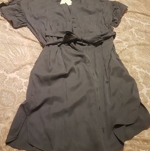 Size 14 dresses, but fits smaller. Shoes size 10